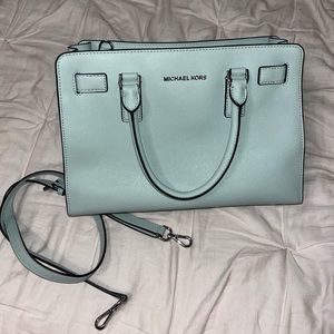 Michael Kors leather mint green cross body purse.